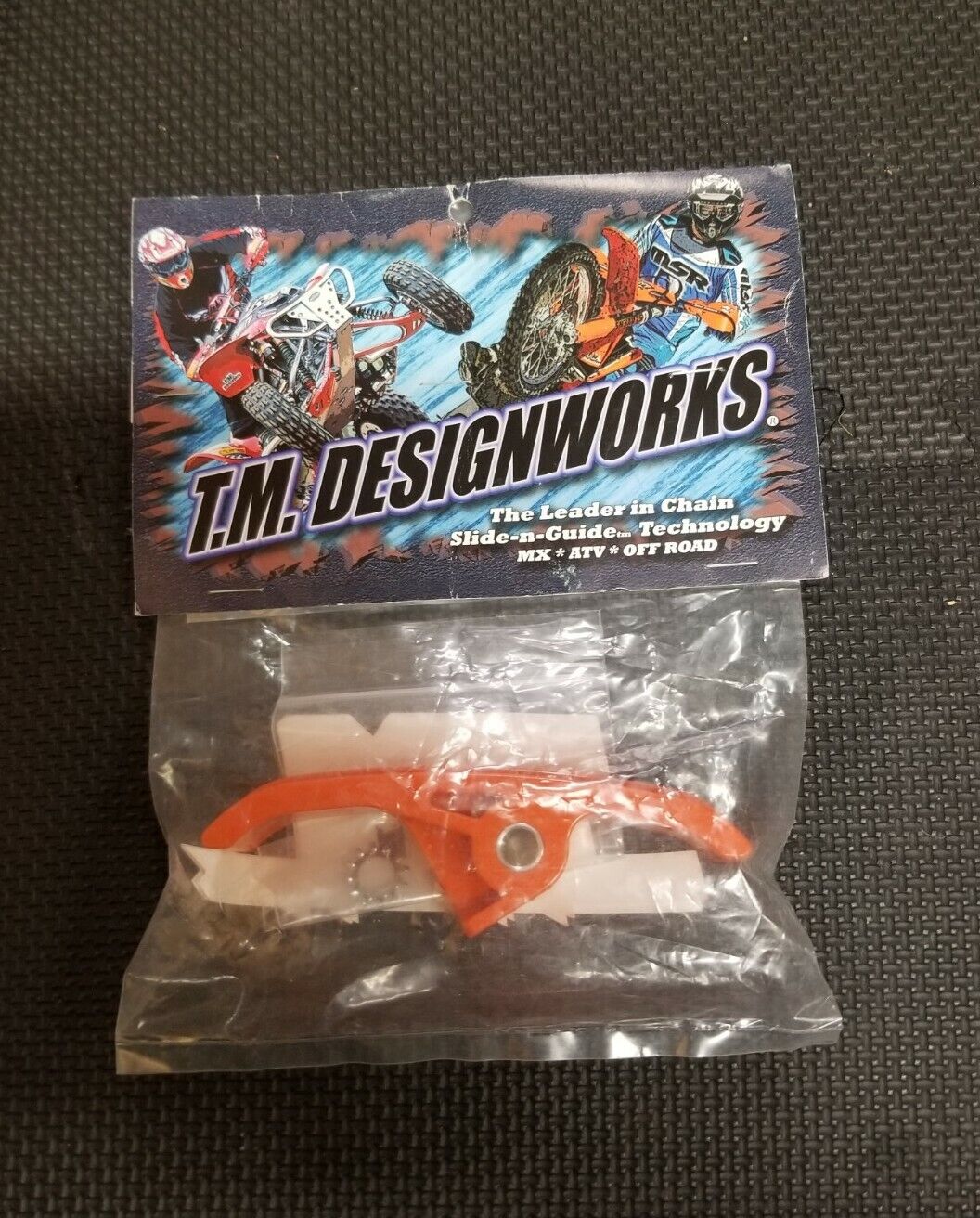 T.M. Designworks KTM-FP2-OR Lower Frame Mount Powerlip Chain Pad Orange KTM